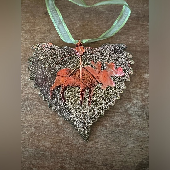 Metal plated Alaska Leaf shaped Christmas ornament with moose. - Picture 3 of 3